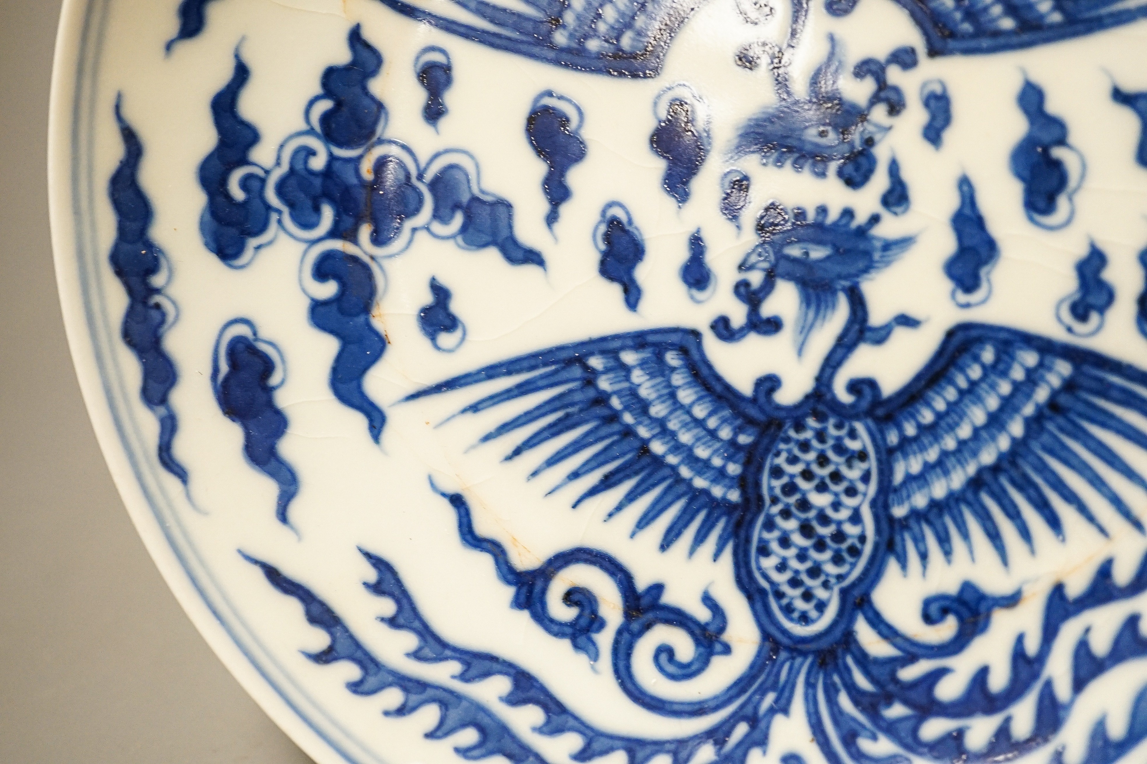 A Chinese blue and white ‘phoenix’ dish 16.5cm